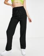 Lola May Eyelet Lace Up Front Wide Leg Pants In Black