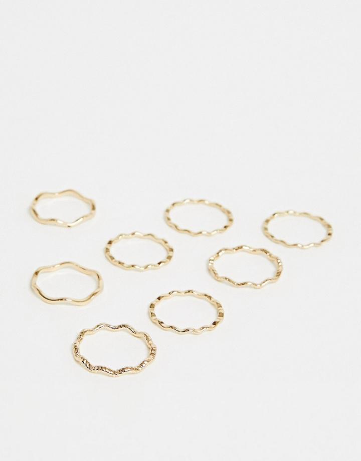 Asos Design Pack Of 8 Rings In Plain And Engraved Wave Design In Gold