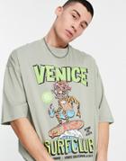 Asos Design Oversized T-shirt In Khaki With Cartoon Surf Front & Back Puff Print-green