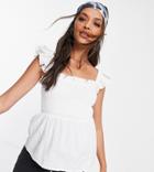 In The Style Nursing X Dani Dyer Shirred Crop Top With Frill Shoulder Detail In White