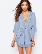 Kiss The Sky Romper With Plunge Neck And Lace Trim