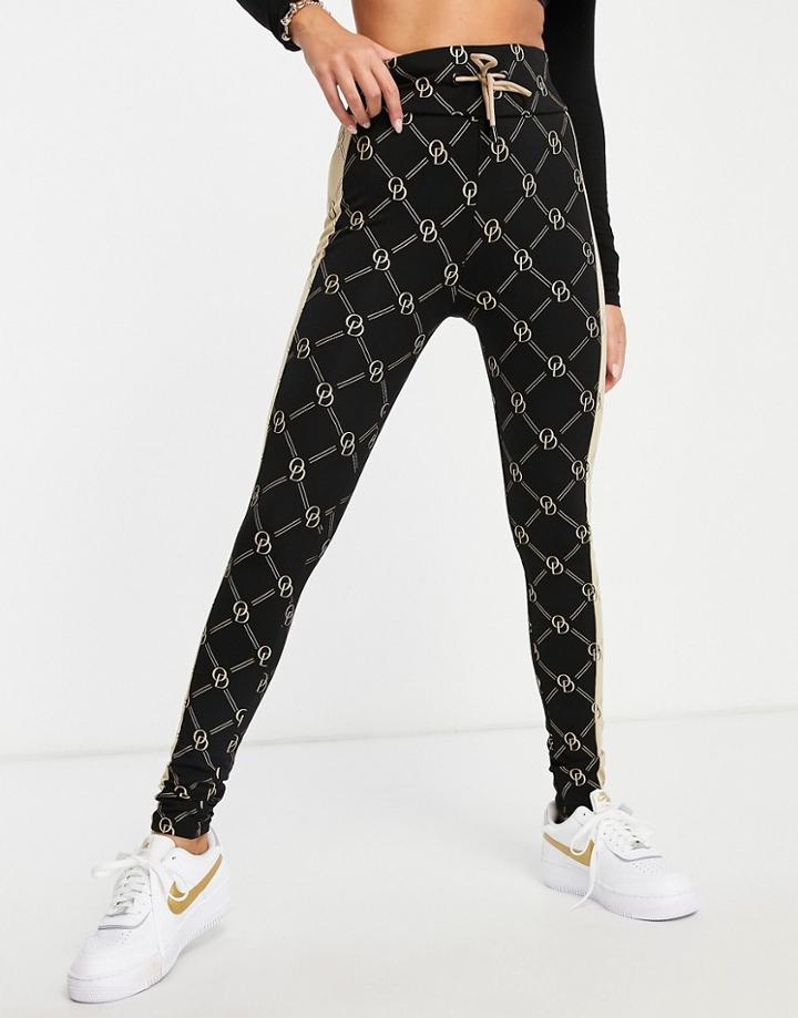 Odolls Collection Contrast Print Logo Sweatpants In Black Multi