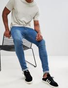 Asos Design Super Skinny Jeans In Mid Wash-blue