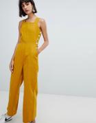 Asos Design Denim Jumpsuit With Side Buttons In Mustard - Yellow