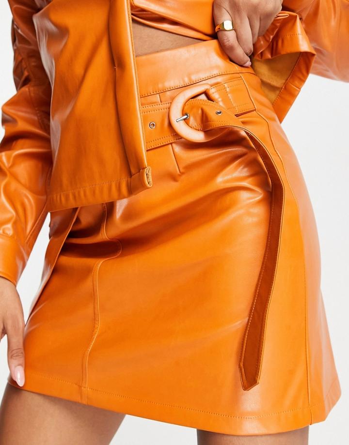 Amy Lynn Pu Mini Skirt With Slit Detailing In Tangerine-orange