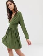 Asos Design Jersey Crepe V Neck Mini Dress With Pleated Skirt-green