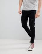 Stradivarius Slim Fit Rip Knee Jeans In Black - Black