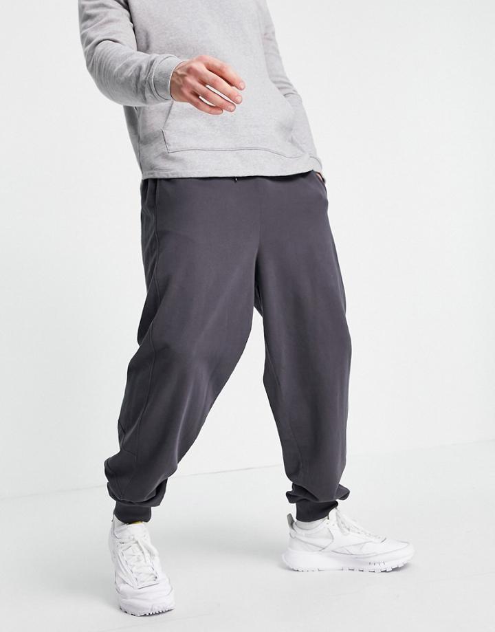 Asos Design Oversized Sweatpants With Side Panelling In Black