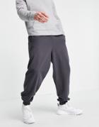 Asos Design Oversized Sweatpants With Side Panelling In Black