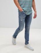 Asos Design Skinny Jeans In Dark Wash Blue With Abrasions - Blue