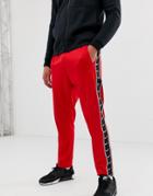 Nike Hybrid Sweatpants In Red