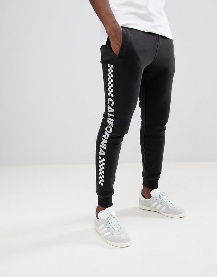 Hollister Side Checkerboard Logo Super Skinny Cuffed Joggers In Black - Black