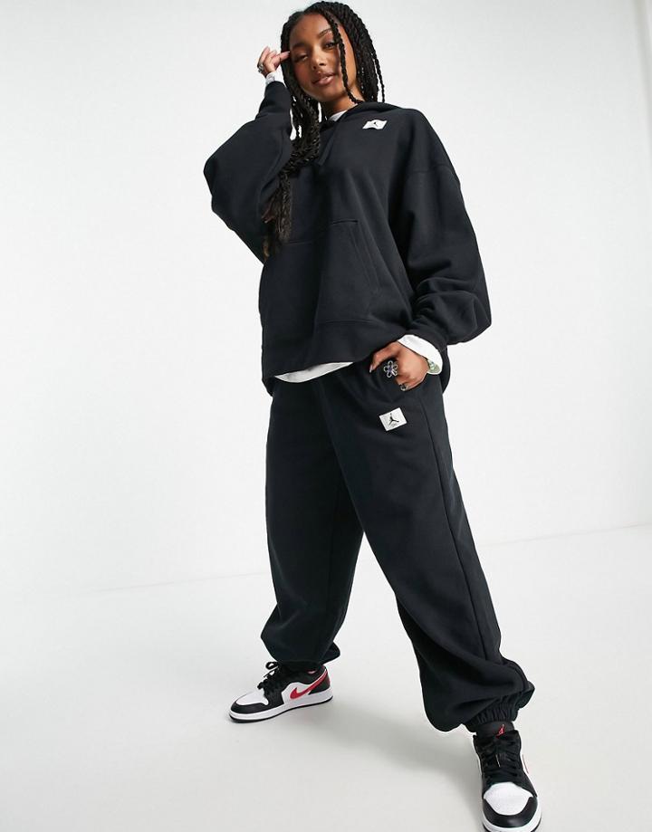 Nike Air Jordan Essential Fleece Sweatpants In Black