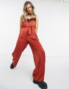 Outrageous Fortune Satin Cami Jumpsuit With Lace Trim In Rust-orange