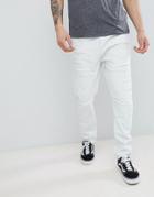Asos Design Drop Crotch Jeans In Bleach Wash Blue With Extreme Rips - Blue