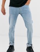 Asos Design Tapered Jeans In Light Wash Blue - Blue