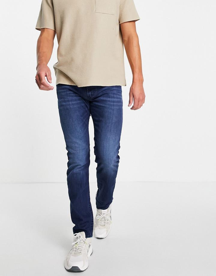 Diesel Thommer-x Slim Leg Jeans In Mid Wash-blues