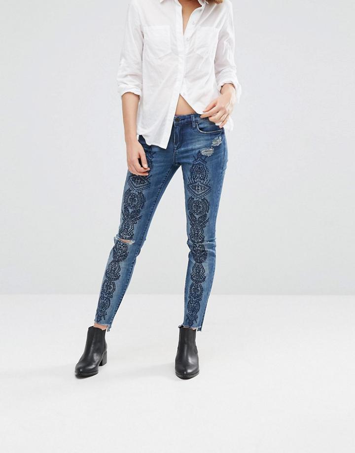 Blank Nyc Print Slim Jeans With Ripped Knees And Raw Hem - Blue
