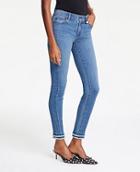 Ann Taylor Double Frayed All Day Skinny Jeans In Bright Mid Indigo Wash