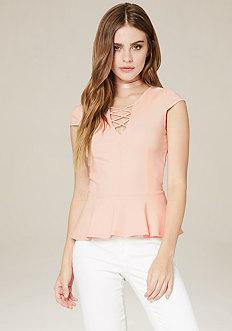 Bebe Lace Up Front Peplum Top
