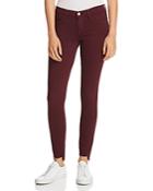 Frame Le Skinny De Jeanne Raw-edge Stagger Jeans In Pinot