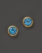 Blue Topaz Bezel Set Stud Earrings In 14k Yellow Gold