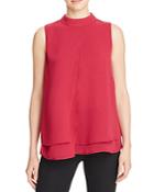 Design History Tiered Asymmetric Top