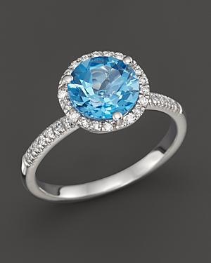 Blue Topaz And Diamond Halo Ring In 14k White Gold
