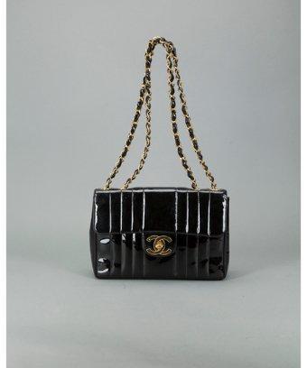 Chanel Pre-owned: Black Patent Leather Vertical Quilt 'maxi Flap' Bag