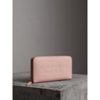 Burberry Burberry Embossed Leather Ziparound Wallet, Pink