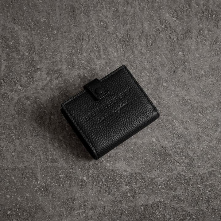 Burberry Burberry Embossed Leather Folding Wallet