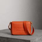 Burberry Burberry Small Embossed Leather Messenger Bag, Orange