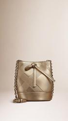 Burberry The Baby Bucket In Embossed Check Leather