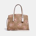 Coach Charlie Carryall In Signature Rose Print