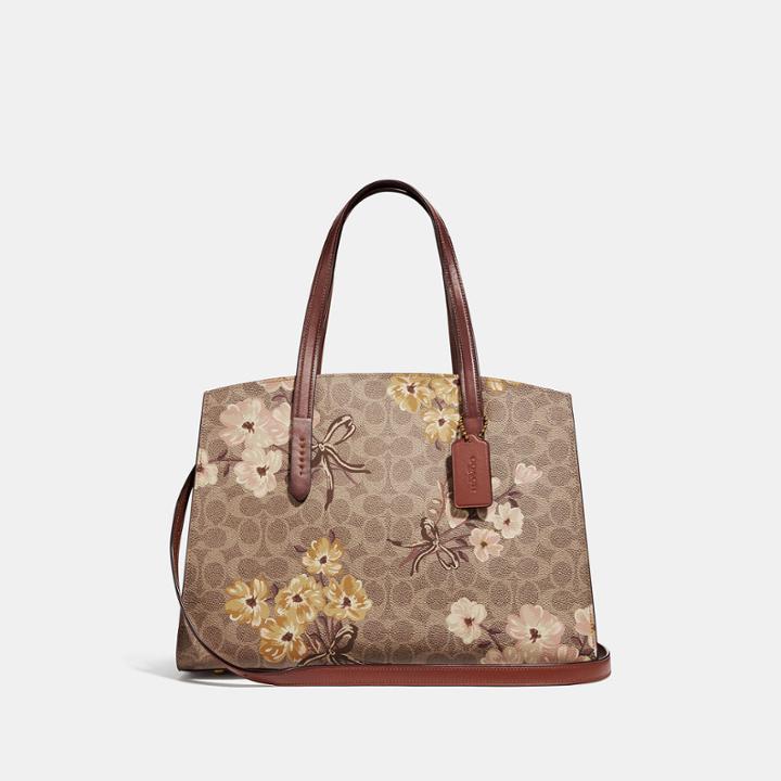 Coach Charlie Carryall In Signature Canvas With Prairie Floral Print