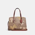 Coach Charlie Carryall In Signature Canvas With Prairie Floral Print
