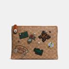 Coach X Keith Haring Turnlock Pouch In Signature Patchwork