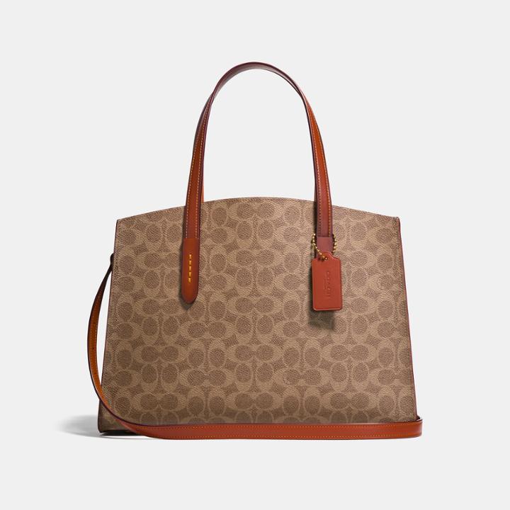 Coach Charlie Carryall In Signature Canvas
