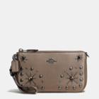 Coach Nolita Wristlet 19 In Glovetanned Leather With Western Rivets