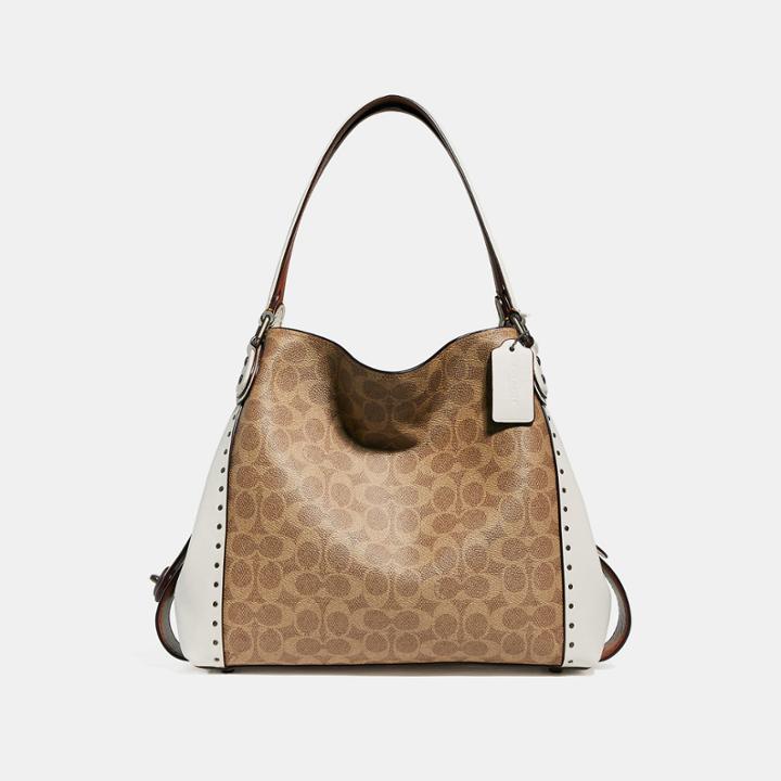 Coach Edie Shoulder Bag 31 In Signature Canvas With Border Rivets