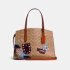 Coach Charlie Carryall In Signature Patchwork
