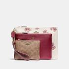 Coach Triple Pouch In Signature Canvas And Floral Print