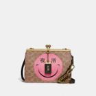 Coach Double Frame Bag In Signature Canvas With Rexy By Yeti Out
