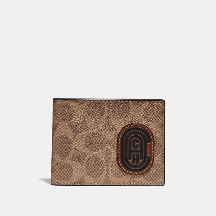 Coach Slim Billfold Wallet With Signature Canvas Blocking And Patch