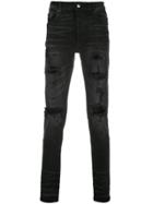 Amiri Ripped Effect Jeans - Black