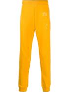 Moschino Tonal Logo Print Track Pants - Yellow