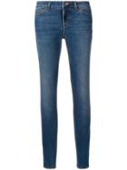 Dolce & Gabbana Skinny Jeans With Floral Button - Blue
