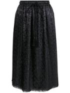 À La Garçonne Pleated Jacquard Skirt - Black