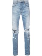 Amiri Faded Distressed Jeans - Blue