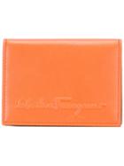 Salvatore Ferragamo Logo Embossed Wallet - Yellow & Orange